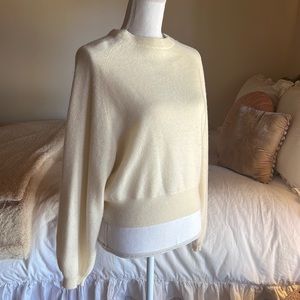 Beautiful cream colored 100% Cashmere Sweater. Size Medium.
